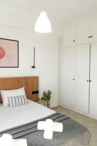 Postel nebo postele na pokoji v ubytování Airy Flat at Xenios Avlais