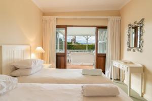 Ένα ή περισσότερα κρεβάτια σε δωμάτιο στο Lagoon Serenity Retreat