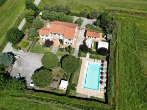 an aerial view of a house with a swimming pool at Villa Chiara Porto Recanati in Porto Recanati
