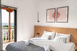 Llit o llits en una habitació de Sea View Studio at Xenios Avlais