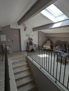 a staircase in a house with a skylight at Casa Ditta in Mela