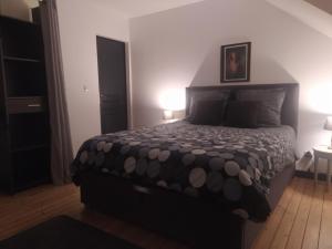 Łóżko lub łóżka w pokoju w obiekcie DS Harmothe
