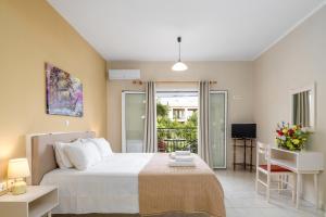 A bed or beds in a room at Dallas Hotel