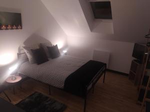 Łóżko lub łóżka w pokoju w obiekcie DS Harmothe