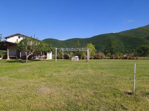 a soccer field with a goal in the grass at Chalet Del Pozzo in Luco neʼ Marsi