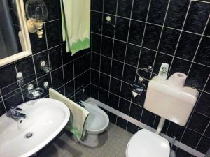 Ванная комната в Reich Motel
