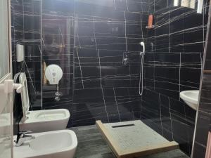 Koupelna v ubytování Hotel Europa
