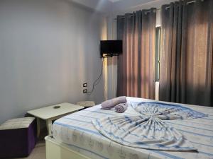 Postel nebo postele na pokoji v ubytování Hotel Europa