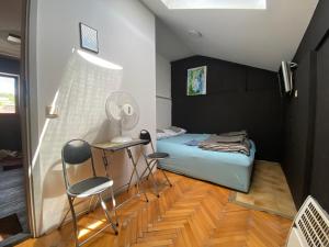Letto o letti in una camera di SAGR ROOMS shared toilet and kitchen