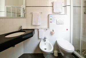 Koupelna v ubytování Albergo Italia