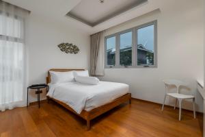 Ένα ή περισσότερα κρεβάτια σε δωμάτιο στο WEG Elite Beachfront +18 φωτογραφίες