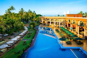 an overhead view of a resort with a swimming pool at Araliya Beach Resort & Spa Unawatuna- Where you meet the sea all year in Unawatuna