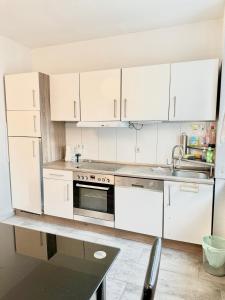 Kjøkken eller kjøkkenkrok på Apartment Mimi Homes Cologne City