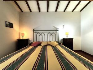 Postel nebo postele na pokoji v ubytování Agriturismo LeGi Toscana