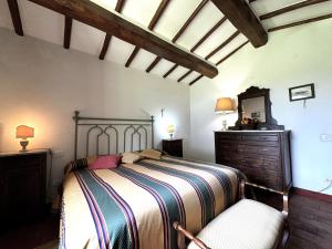 Postel nebo postele na pokoji v ubytování Agriturismo LeGi Toscana