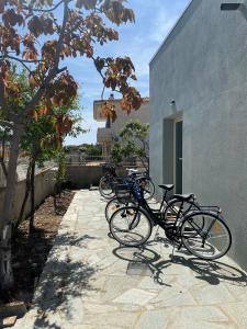 a row of bikes parked next to a building at Ajo' da Paolo in Budoni