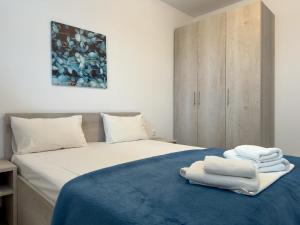 Postel nebo postele na pokoji v ubytování Blue Horizon 2