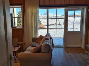 Posezení v ubytování Hallfreðarstaðir 1 Apartments + 37 fotografií
