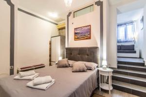 Postel nebo postele na pokoji v ubytování Giovanna Boutique Rooms & Pool