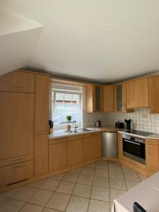 Kuchyň nebo kuchyňský kout v ubytování Moderne Ferienwohnung + 6 fotografií