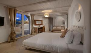 Posteľ alebo postele v izbe v ubytovaní Luxury Villa - Platis Gialos - Pool + 37 fotografií