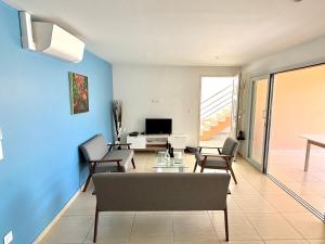 Posezení v ubytování Villa Émeraude - Vue sur Piscine et Jacuzzi privé