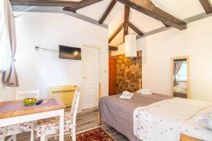 Postel nebo postele na pokoji v ubytování Giovanna Boutique Rooms & Pool