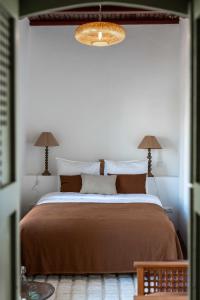 Postel nebo postele na pokoji v ubytování Riad Petite Rêverie