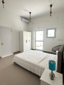 Katil atau katil-katil dalam bilik di WaveBreeze Villas
