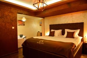 Кровать или кровати в номере Avenia