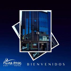 une photo d'un bâtiment avec des fenêtres en verre dans l'établissement Hotel Punta Rocas - Huacho, à Huacho