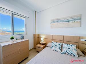 Postel nebo postele na pokoji v ubytování Luz de Mar