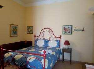 Postel nebo postele na pokoji v ubytování B&B Le Buche Casa Storica