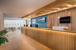 Телевизор и/или развлекательный центр в Occidental Torremolinos Playa