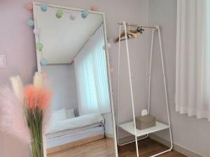 Ένα ή περισσότερα κρεβάτια σε δωμάτιο στο Gwang An Stay