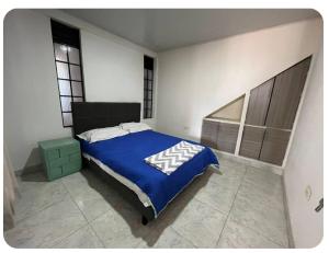 Voodi või voodid majutusasutuse Apartamento Familiar Complejo Acuático, centros Médicos y Polideportivo toas