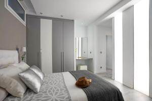 Posteľ alebo postele v izbe v ubytovaní Apartamento Lagun Concha Beach