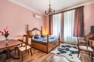 Postel nebo postele na pokoji v ubytování Giovanna Boutique Rooms & Pool