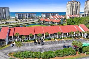 an aerial view of a resort with a red roof at Edgewater Golf Villa 605 in Panama City Beach