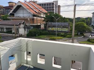 a view of a city from the roof of a building at Jida Place in Chiang Mai +122 photos