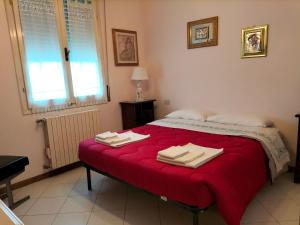Postel nebo postele na pokoji v ubytování Il Cantinoccio B&B