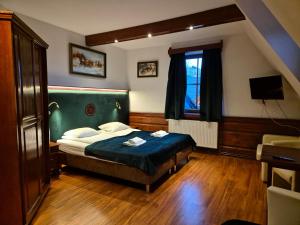 Posteľ alebo postele v izbe v ubytovaní Chata Walczaków -Blue Cave Cottage