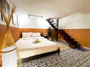 Postel nebo postele na pokoji v ubytování La Casa Di Dicembre 36B Trần Hưng Đạo