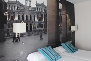 Postel nebo postele na pokoji v ubytování ELE Enara Boutique Hotel