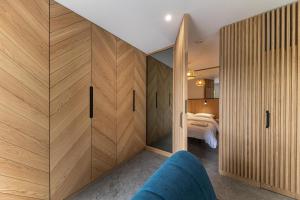 En eller flere senge i et værelse på Apartamenty Activ Zdrój