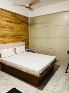 Katil atau katil-katil dalam bilik di Woodland residency