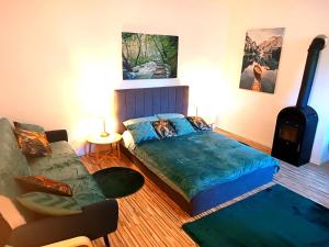 Letto o letti in una camera di Family Apartments center of Mürzzuschlag