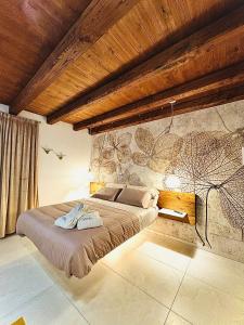 Postel nebo postele na pokoji v ubytování Sentimento Luxury Rooftop