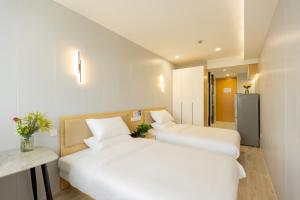 Katil atau katil-katil dalam bilik di KeTangJian Aparthotel