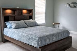 Giường trong phòng chung tại Big Oak